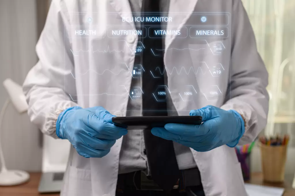 The image depicts a healthcare professional in a lab coat and blue gloves, holding a transparent digital tablet that displays a futuristic user interface with various health-related metrics. The screen includes categories like "Health," "Nutrition," "Vitamins," and "Minerals," along with various charts and numerical values that resemble vital signs monitoring typically seen in an ICU (Intensive Care Unit). This advanced technology concept symbolizes the integration of digital tools and data analytics into patient care. It serves as a powerful visual metaphor for an omnichannel marketing approach in the healthcare sector, where various channels and platforms are utilized to create a seamless and interconnected patient experience, leveraging technology to meet the needs of modern healthcare consumers.