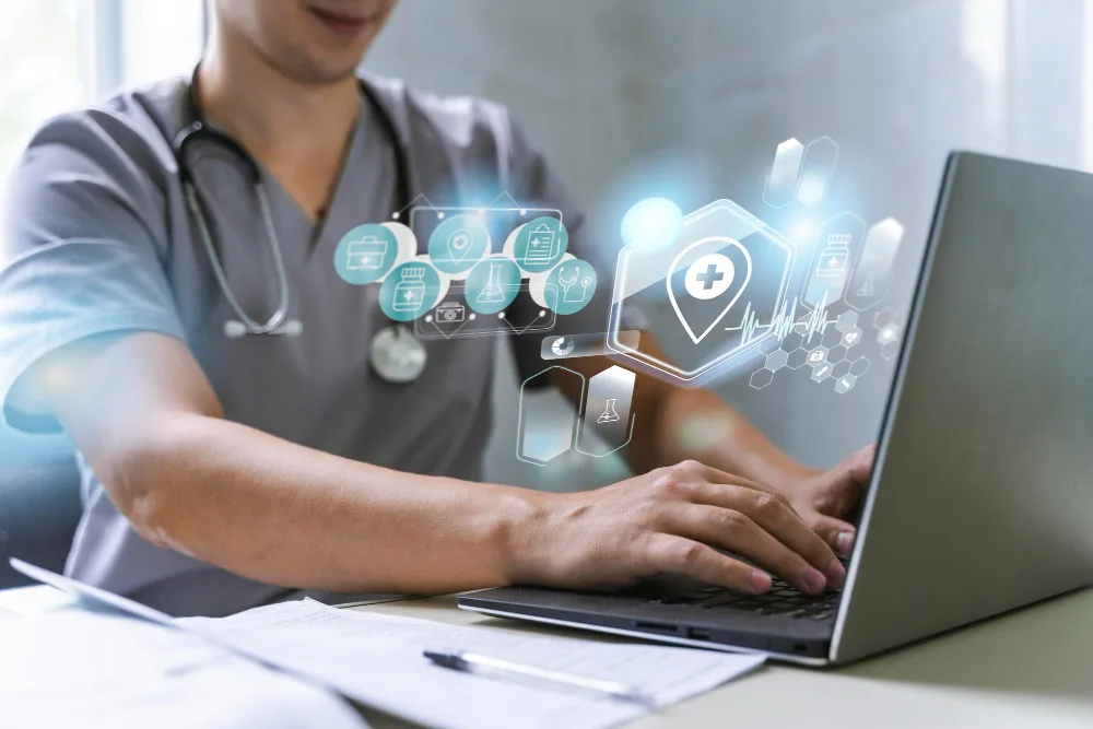 An image of a healthcare worker at a laptop, with virtual healthcare-related icons and graphics, represents the intersection of healthcare strategies and content personalization. This suggests the use of technology in creating personalized healthcare plans or managing patient data to improve care delivery.